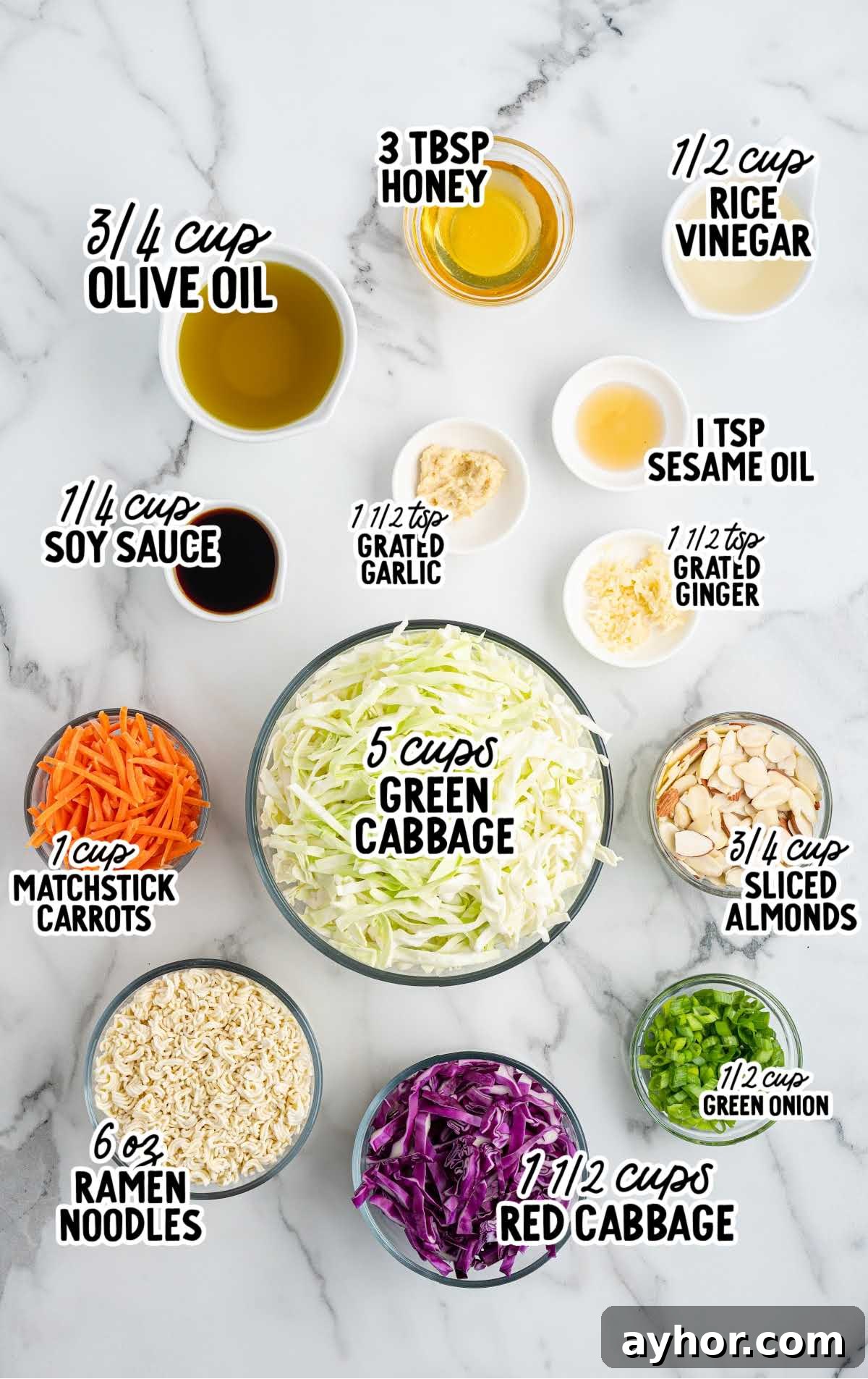 Crunchy Japanese Ramen Noodle Salad with Sesame-Ginger Dressing 3 Overhead view of labeled ingredients for ramen noodle salad including cabbage, ramen noodles, soy sauce, vinegar, and almonds