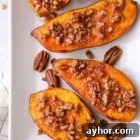 These roasted sweet potatoes with maple pecan sauce are the ultimate sweet and savory side dish!