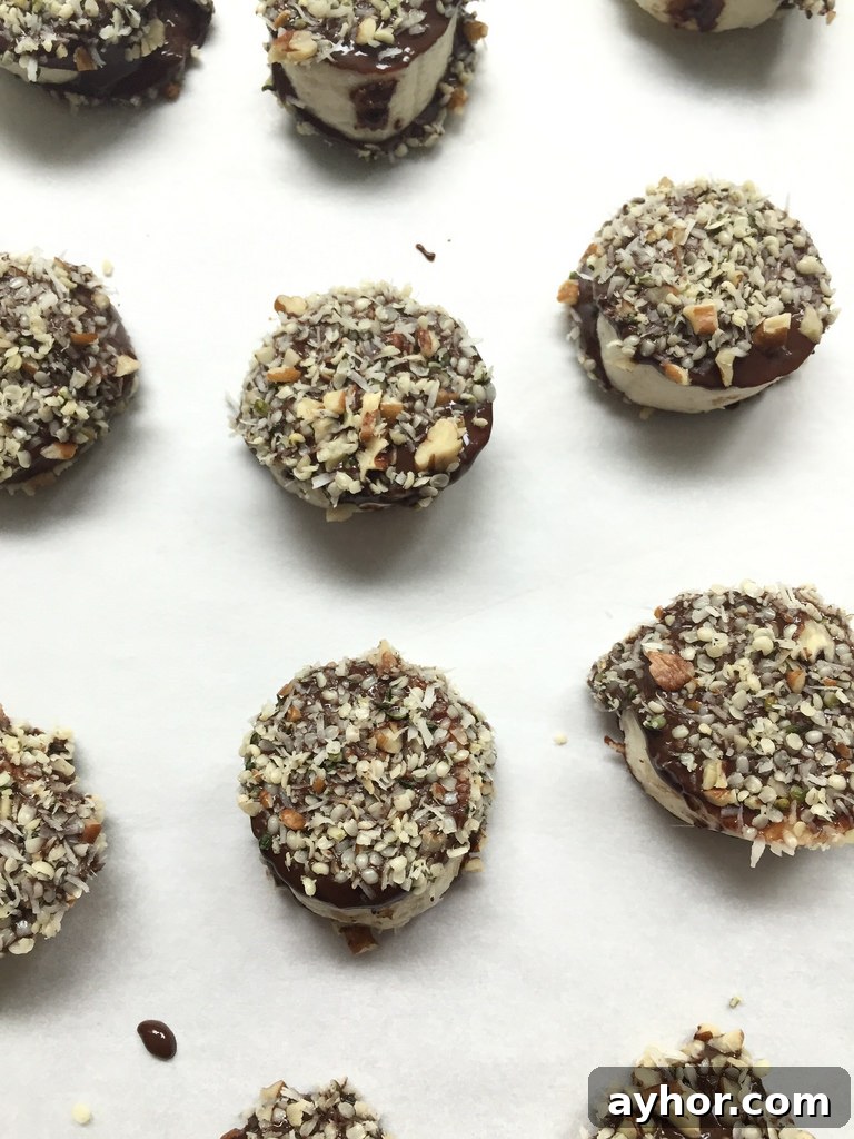 Frozen Chocolate-and-Hemp-Smothered Banana Bites via LizsHealthyTable.com Frozen Chocolate-and-Hemp-Smothered Banana Bites via LizsHealthyTable.com