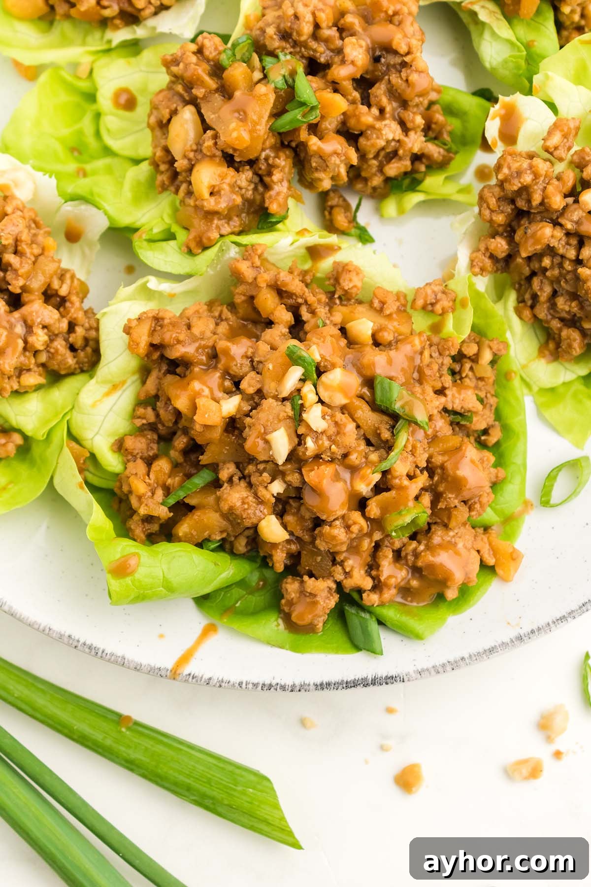 Savory Chicken Lettuce Wraps Recipe with Ginger and Soy 5 chicken lettuce wraps up close.
