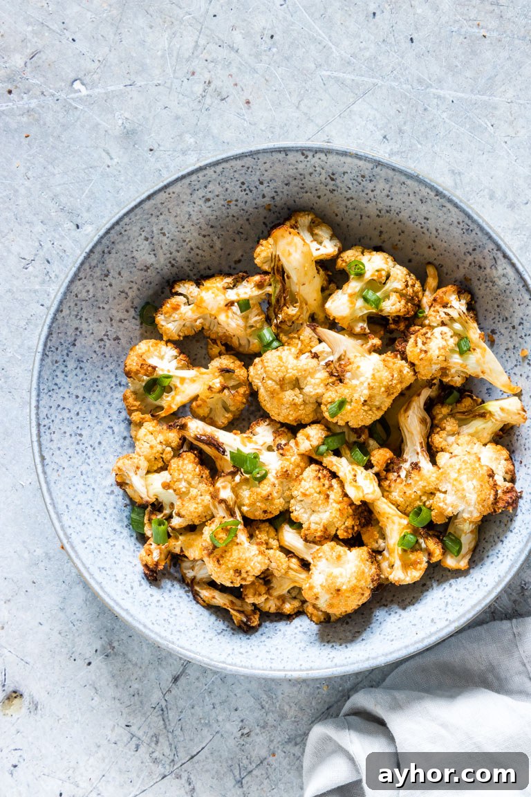 Crispy Air-Fryer Cauliflower Wings with Spicy Dipping Sauce 2 the completed cauliflower wings air fryer recipe served in a blue bowl