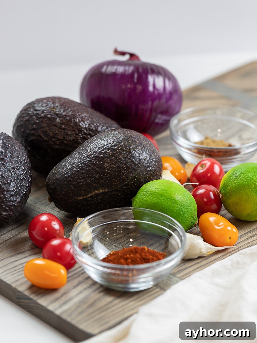 Ingredients for taco avocado boats, including avocados and taco spices.