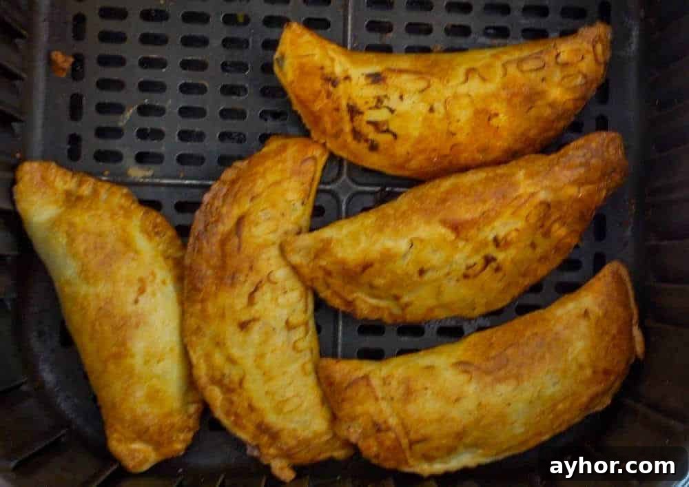 Crispy Air Fryer Empanadas Recipe — Homemade and Flavorful 7 cooked empanadas in air fryer