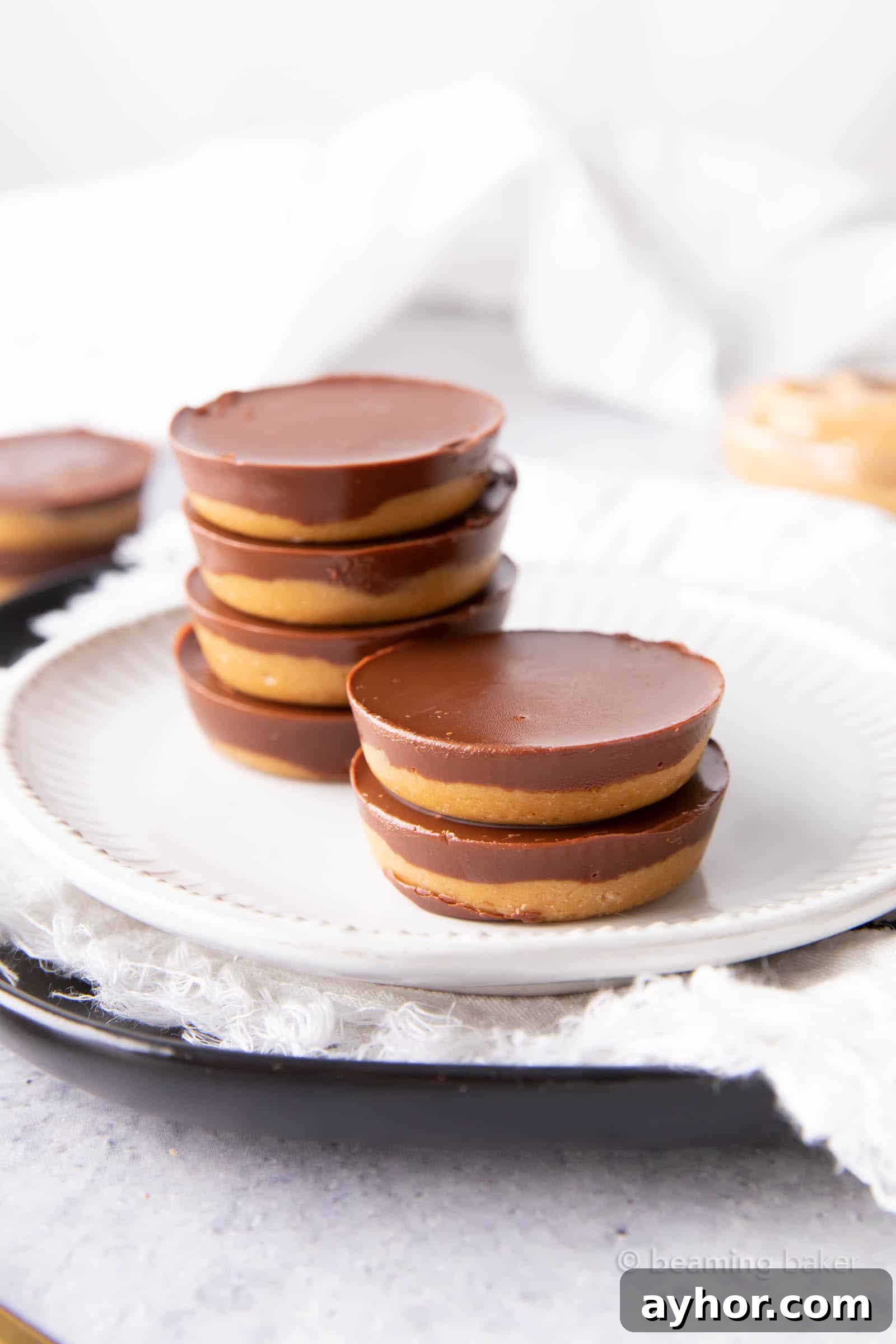 Vegan 4-Ingredient Dark Chocolate Peanut Butter Cups 4 Thick chocolate topping and creamy peanut butter