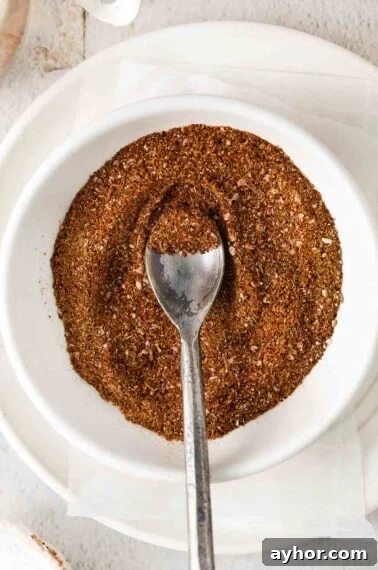 Taco seasoning in a bowl with a spoon