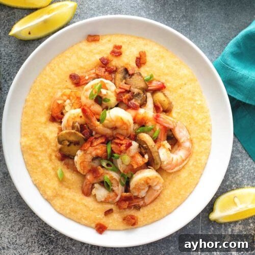 Cajun Shrimp and Grits: Creamy Southern Comfort Recipe 8 Top view of a bowl of creamy grits topped with shrimp.