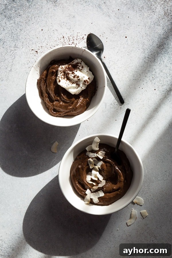 Silky Avocado Chocolate Mousse Recipe 2 Whipped avocado chocolate mousse served in ramekins with toppings
