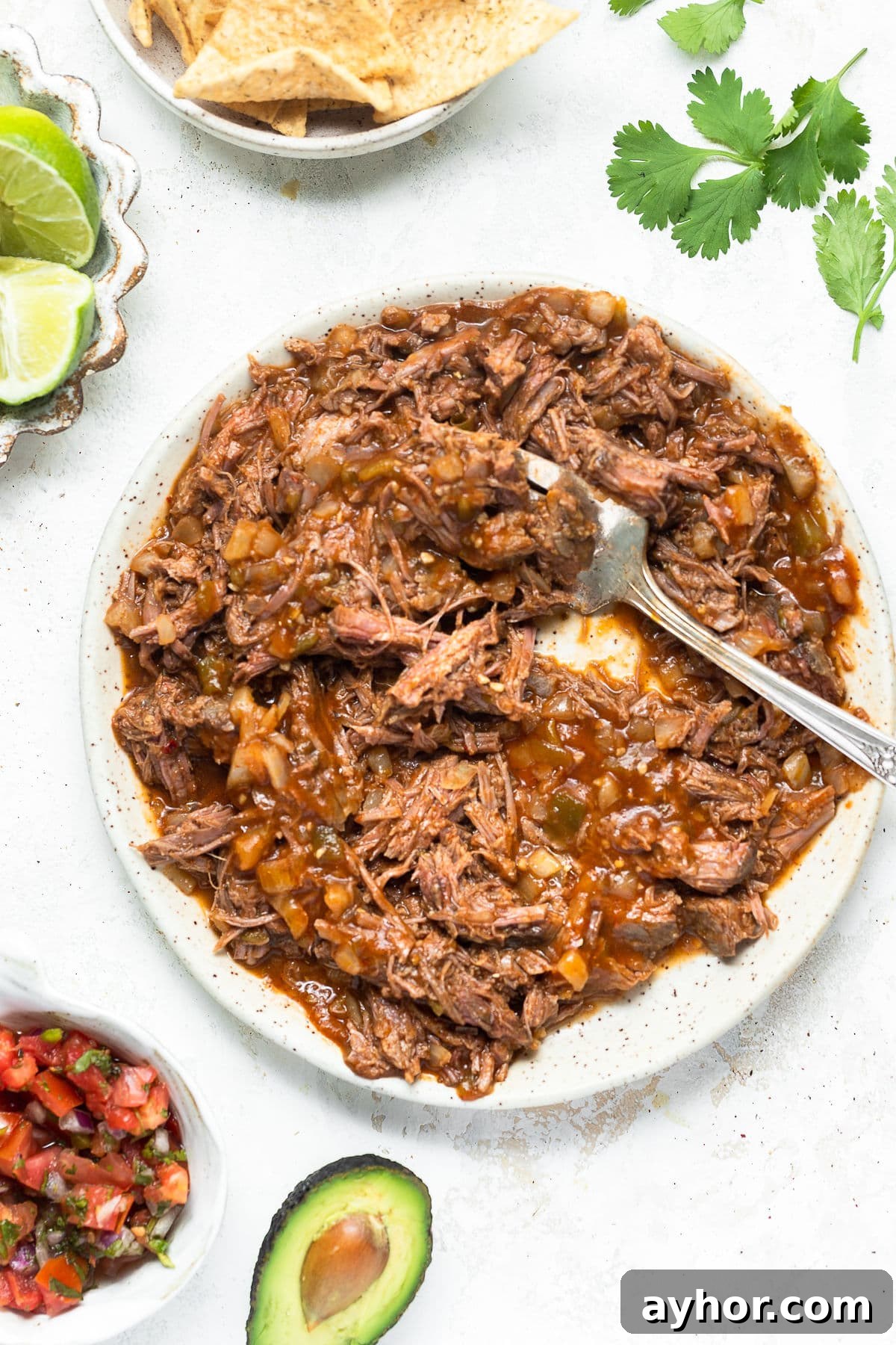 Slow Cooker Shredded Beef Recipe for Tacos and Sandwiches 11 crockpot shredded beef
