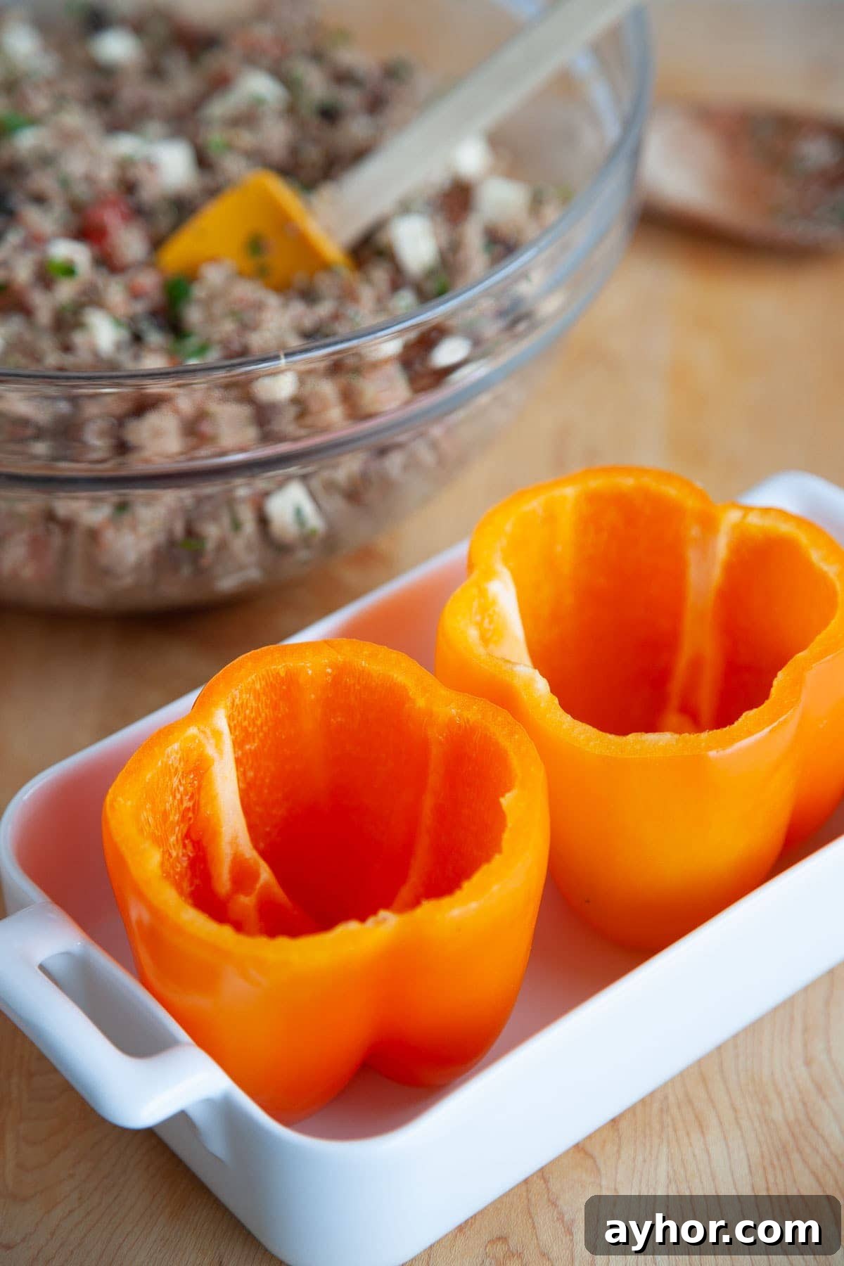 Ground Turkey Stuffed Peppers with Savory Tomato Rice 9 Orange stuffed bell peppers with ground turkey and cheese.