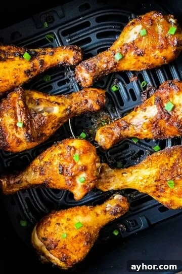 A closeup overhead picture of crispy air fryer chicken legs.