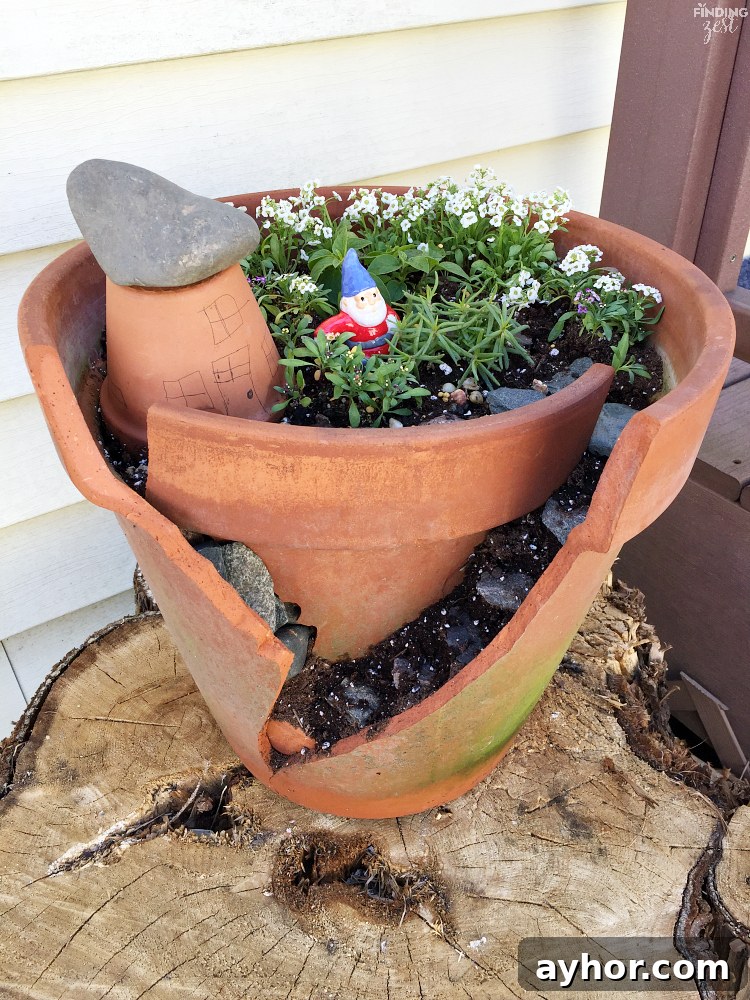 Learn how to build a fairy garden with kids in clay pots. This kids activity is a great opportunity to teach about plants while having fun! Learn how to make both styles including a fairy garden scene with butterflies and a gnome house with broken pot rock steps.