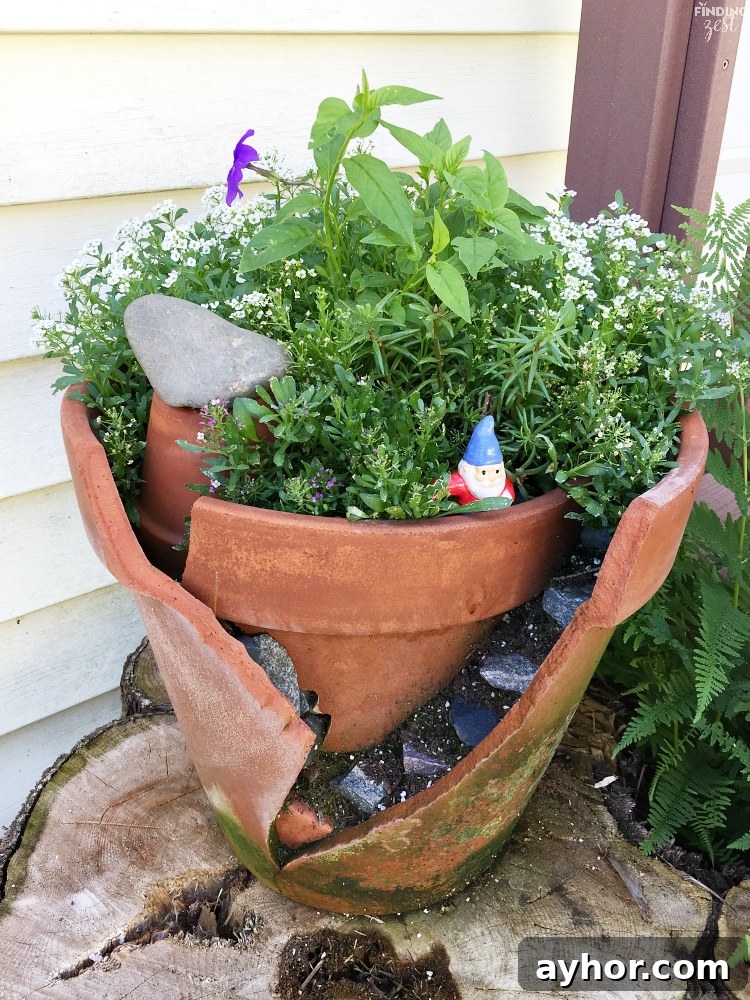 Learn how to build a fairy garden with kids in clay pots. This kids activity is a great opportunity to teach about plants while having fun! Learn how to make both styles including a fairy garden scene with butterflies and a gnome house with broken pot rock steps.