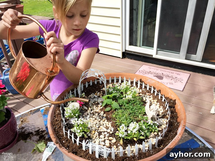 Learn how to build a fairy garden with kids in clay pots. This kids activity is a great opportunity to teach about plants while having fun! Learn how to make both styles including a fairy garden scene with butterflies and a gnome house with broken pot rock steps.