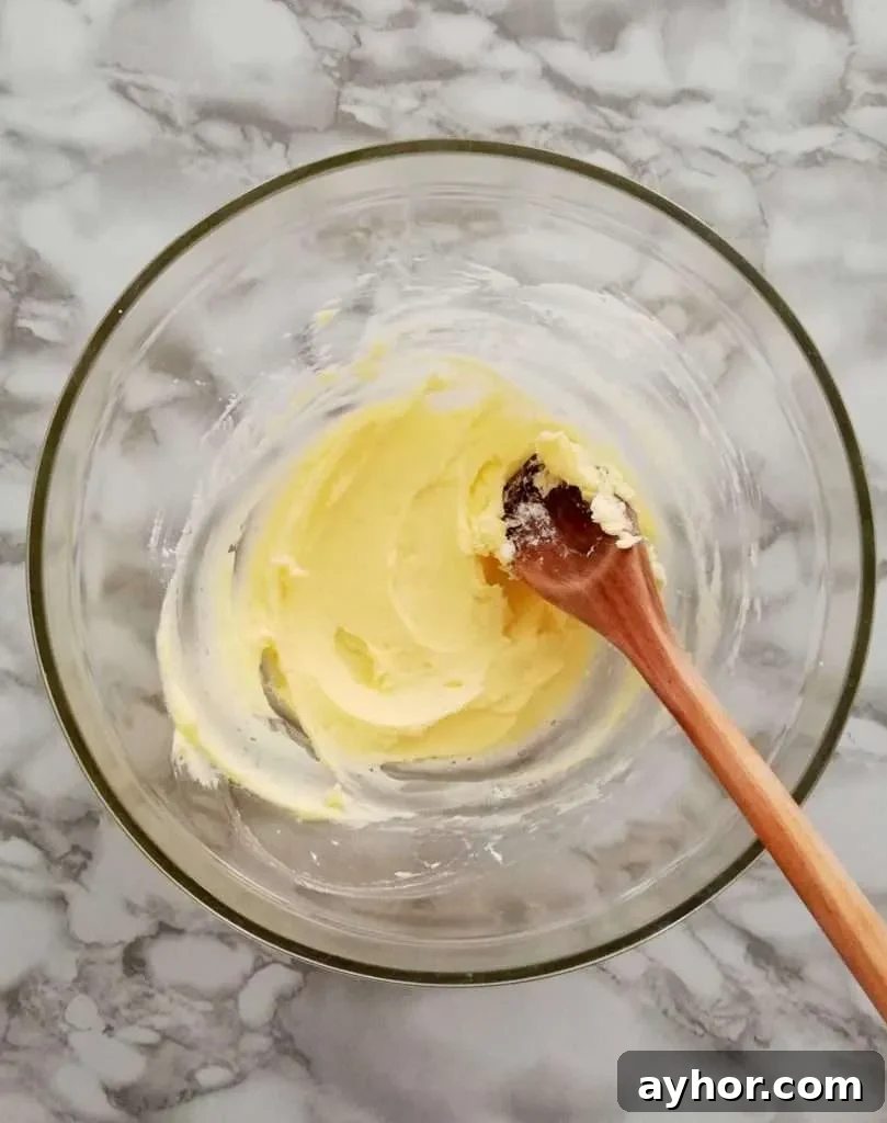 apricot jam filled sandwich cookies butter and sugar creamed together in bowl