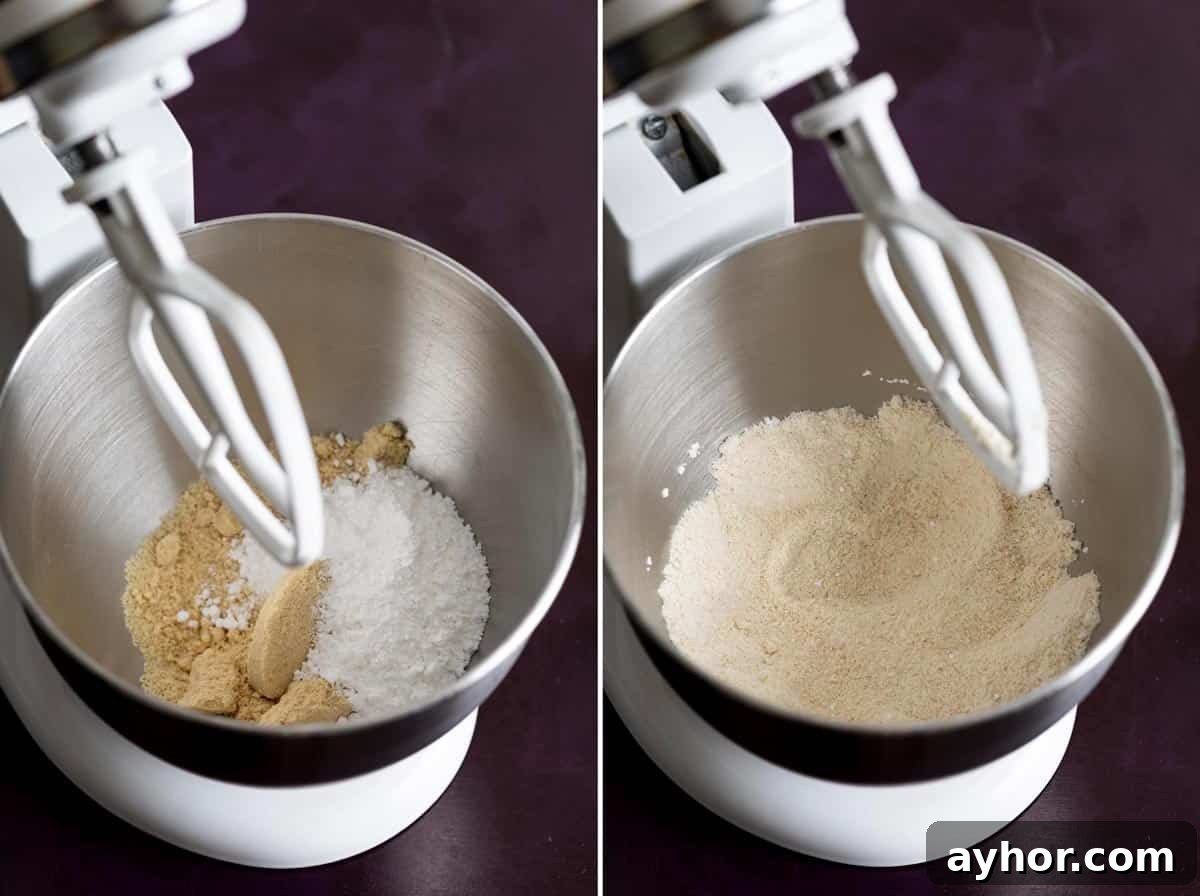 Homemade Almond Paste Recipe with Video Tutorial 4 Mixing almond flour and powdered sugar in a stand mixer bowl.