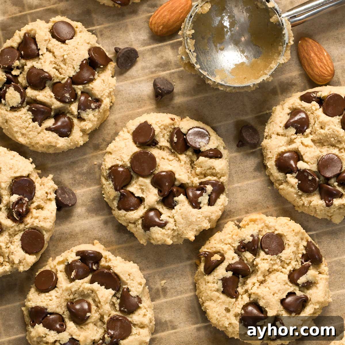 Gluten-free chocolate chip cookies on a cookie sheet.