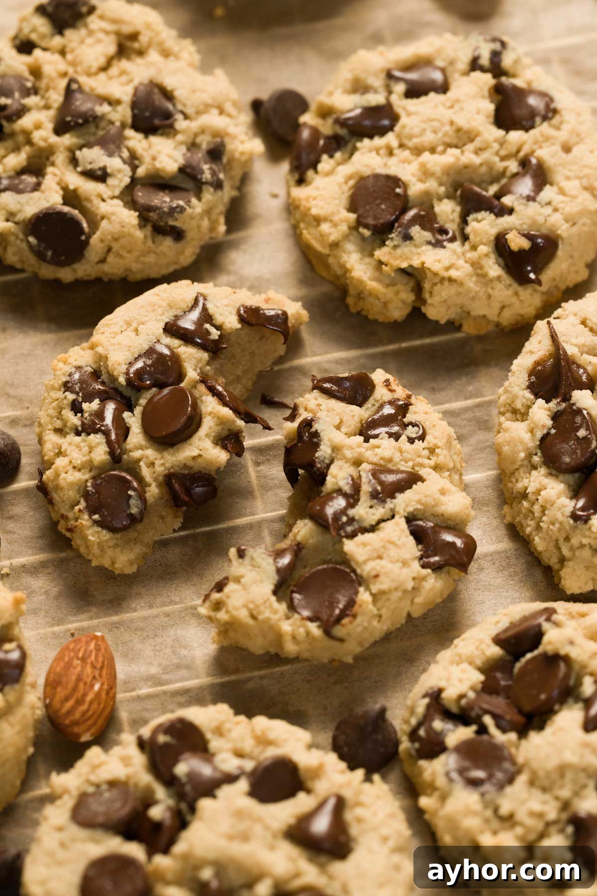 Gluten-free chocolate chip cookies on a cookie sheet.
