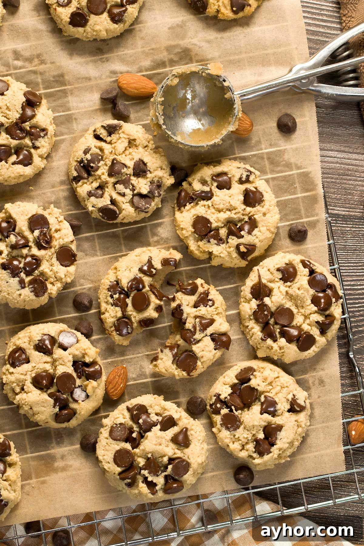 Gluten-free chocolate chip cookies on a cookie sheet.