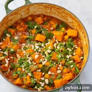 Peanut stew with sweet potatoes in a pot.