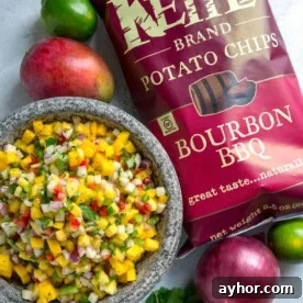 This south of the border, tropical influenced, Mango Pico de Gallo is a hit every time. Sweet and tangy pieces of mango mixed with diced peppers, jicama, red onion and cilantro all marinate in fresh lime juice, cumin and garlic. 
