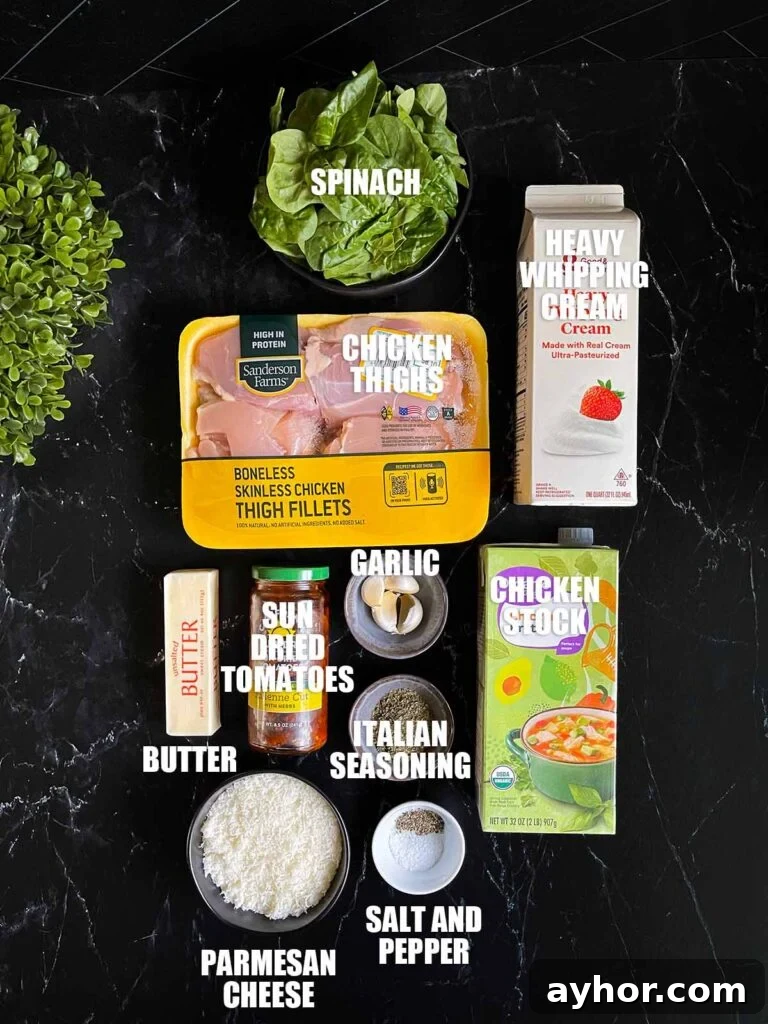 Slow cooker tuscan chicken ingredients on a dark surface.