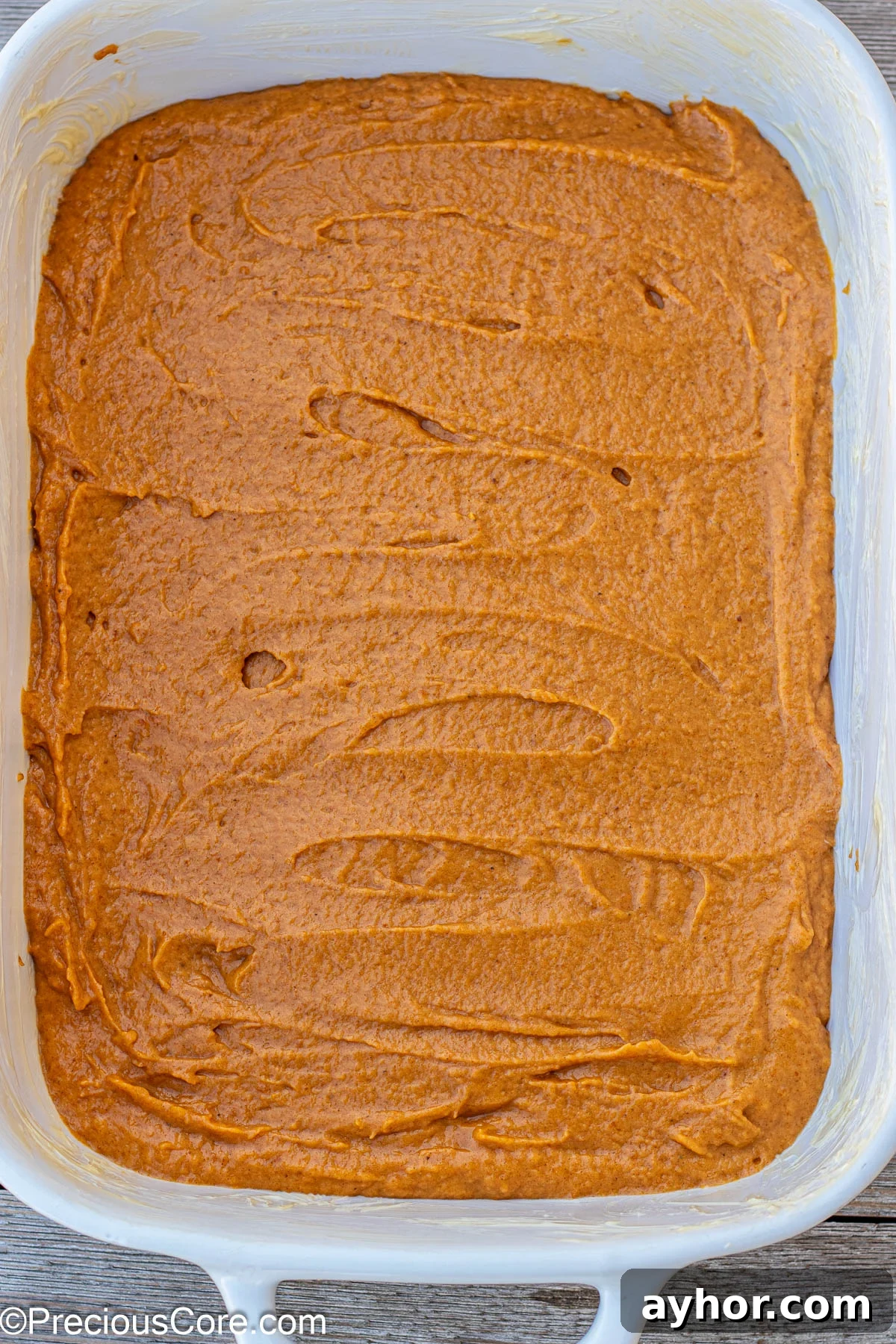 Pumpkin Cake Batter in 9 by 13 pan.