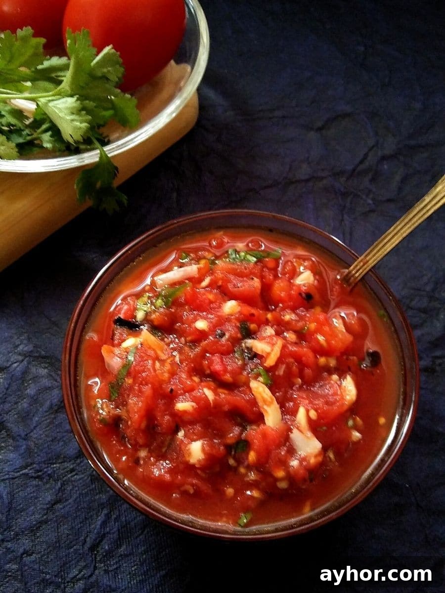 Fire roasted tomato onion garlic chutney in a bowl
