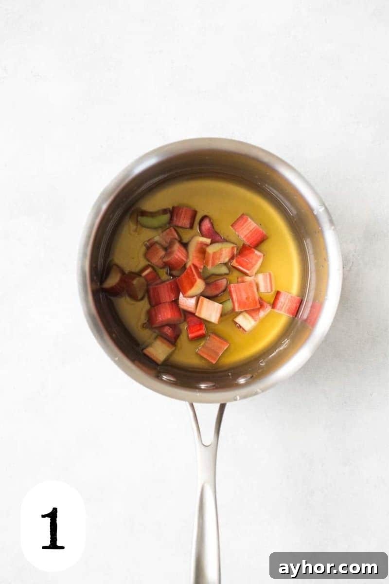 Rhubarb Bourbon Sour: Spring Cocktail Recipe with Rye Twist 4 Honey syrup in a saucepan.