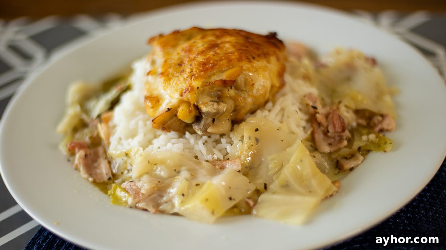 Instant Pot Chicken and Cabbage Dinner Recipe 2 Crispy chicken thigh over cabbage, bacon and rice