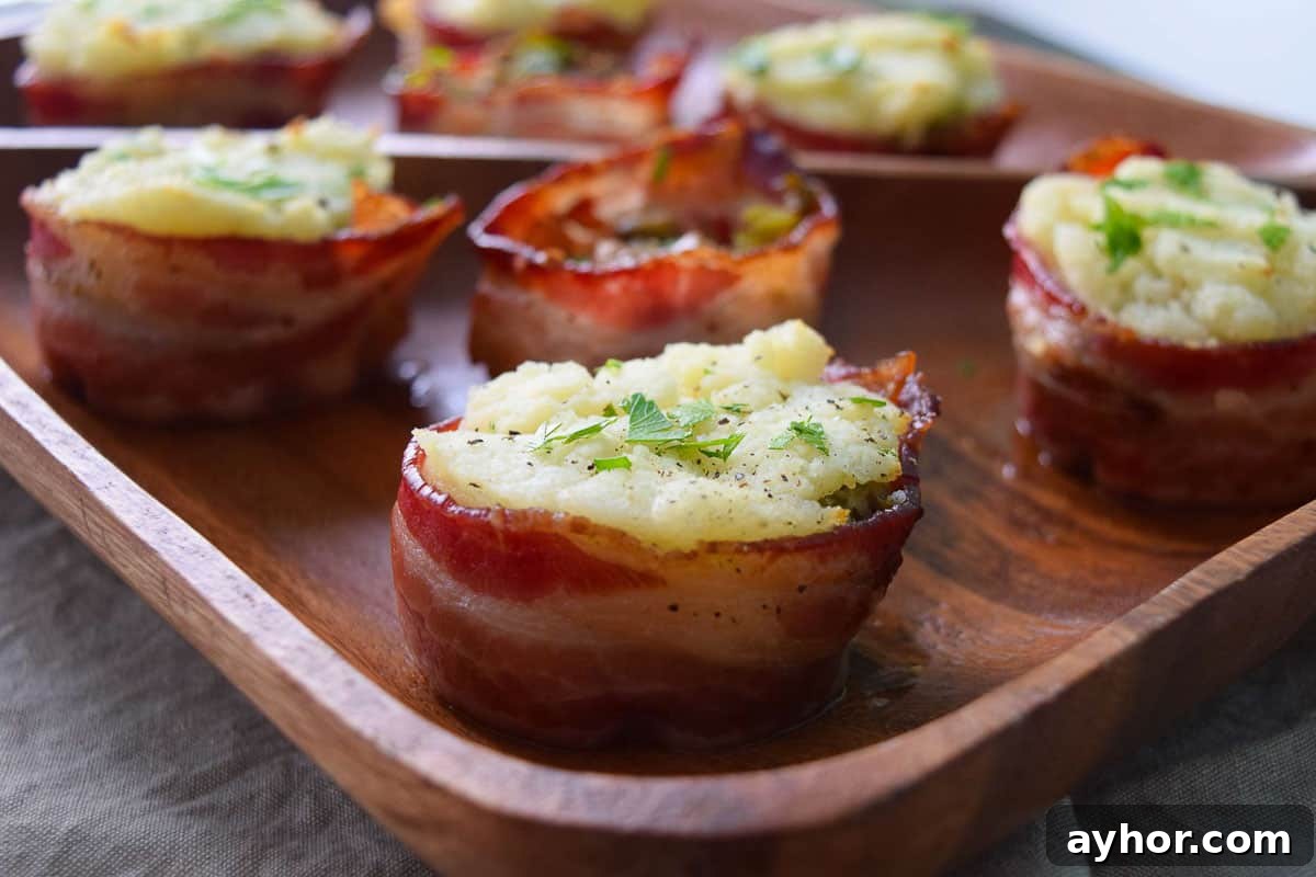Thanksgiving Leftover Bacon Cups Recipe: Quick Holiday Appetizer 3 Close up view of bacon cups stuffed with mashed potatoes