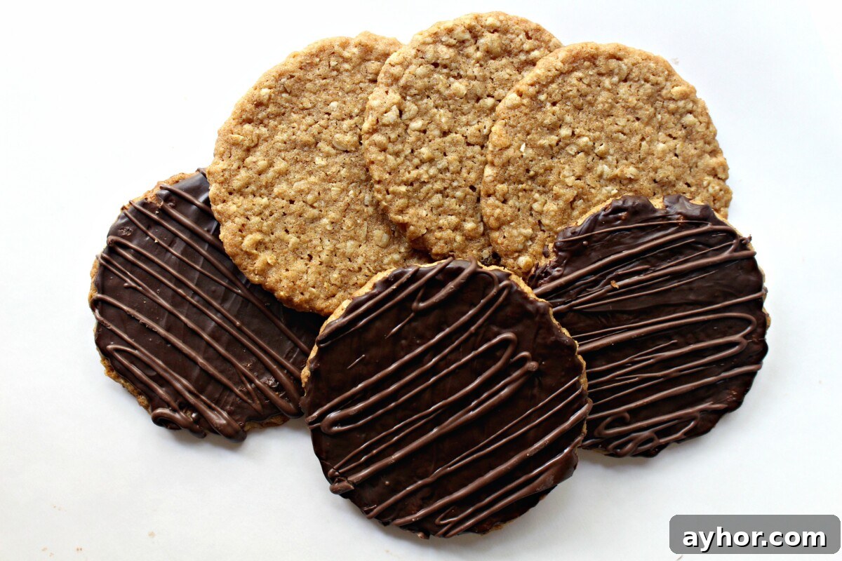 Chocolate-Covered Hobnob Oat Cookies Recipe 6 Three oat cookies without chocolate and three with chocolate coating.