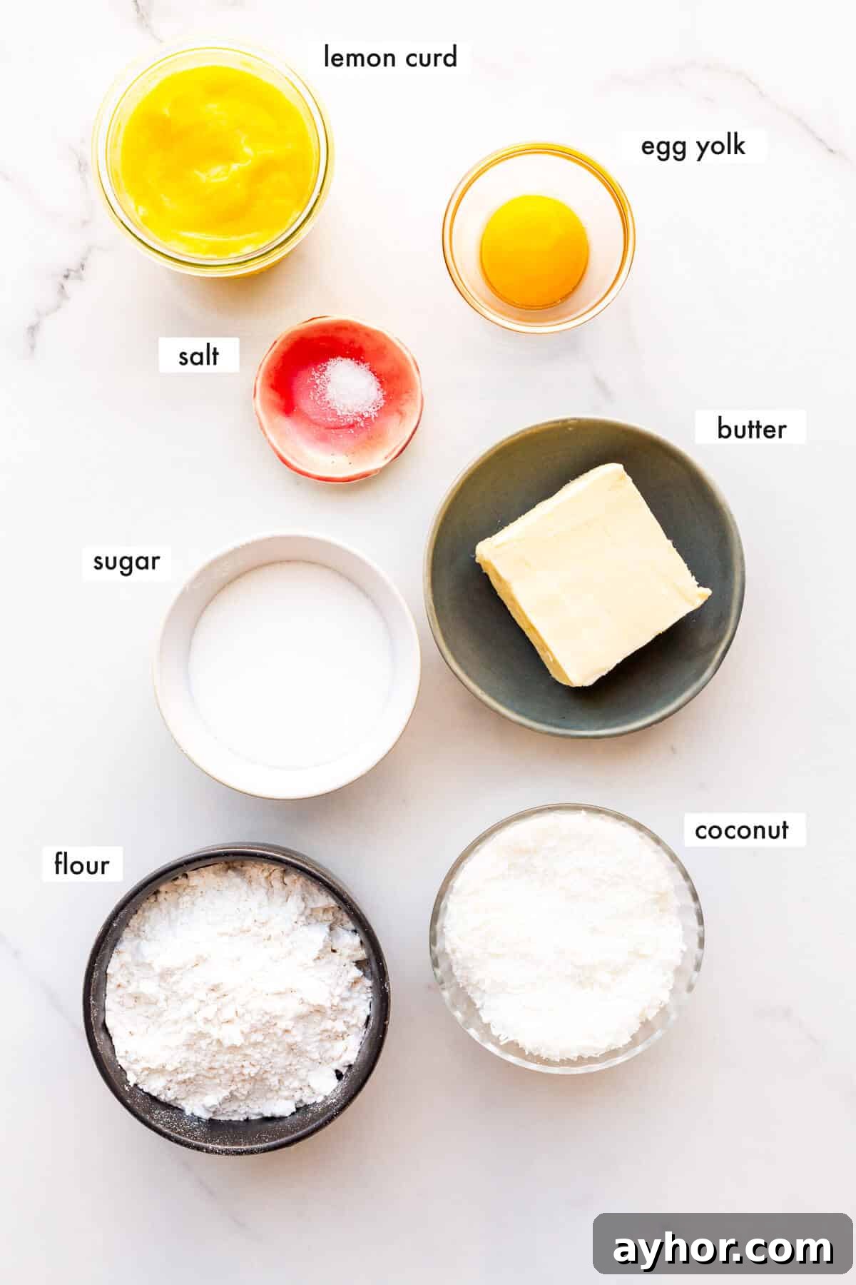 Ingredients to make coconut shortbread cookies with a lemon curd filling measured out.