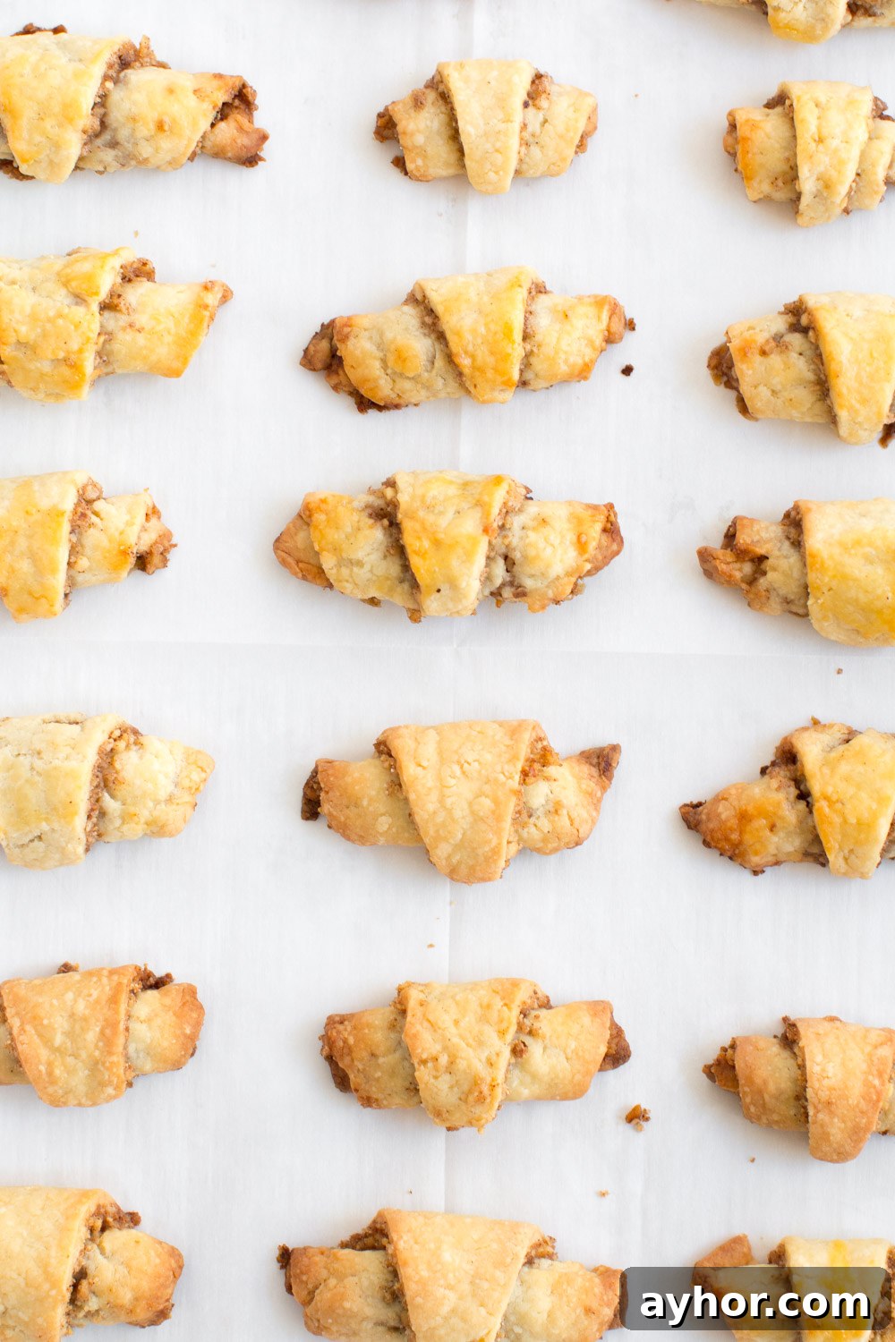 Maple Walnut Rugelach baked - overhead on parchment paper