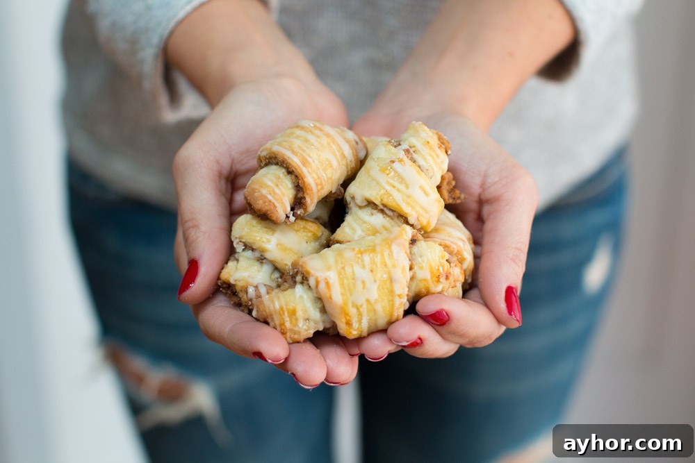 a handful of Maple Walnut Rugelach by Baking the Goods