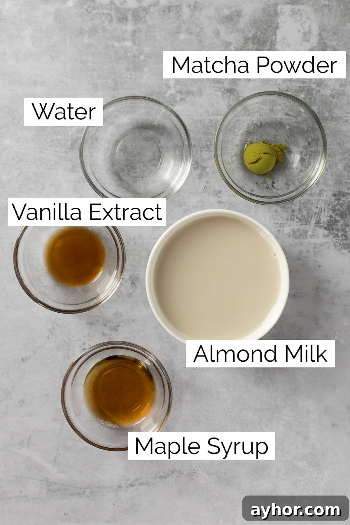 Overhead view of the ingredients needed to make the matcha latte.