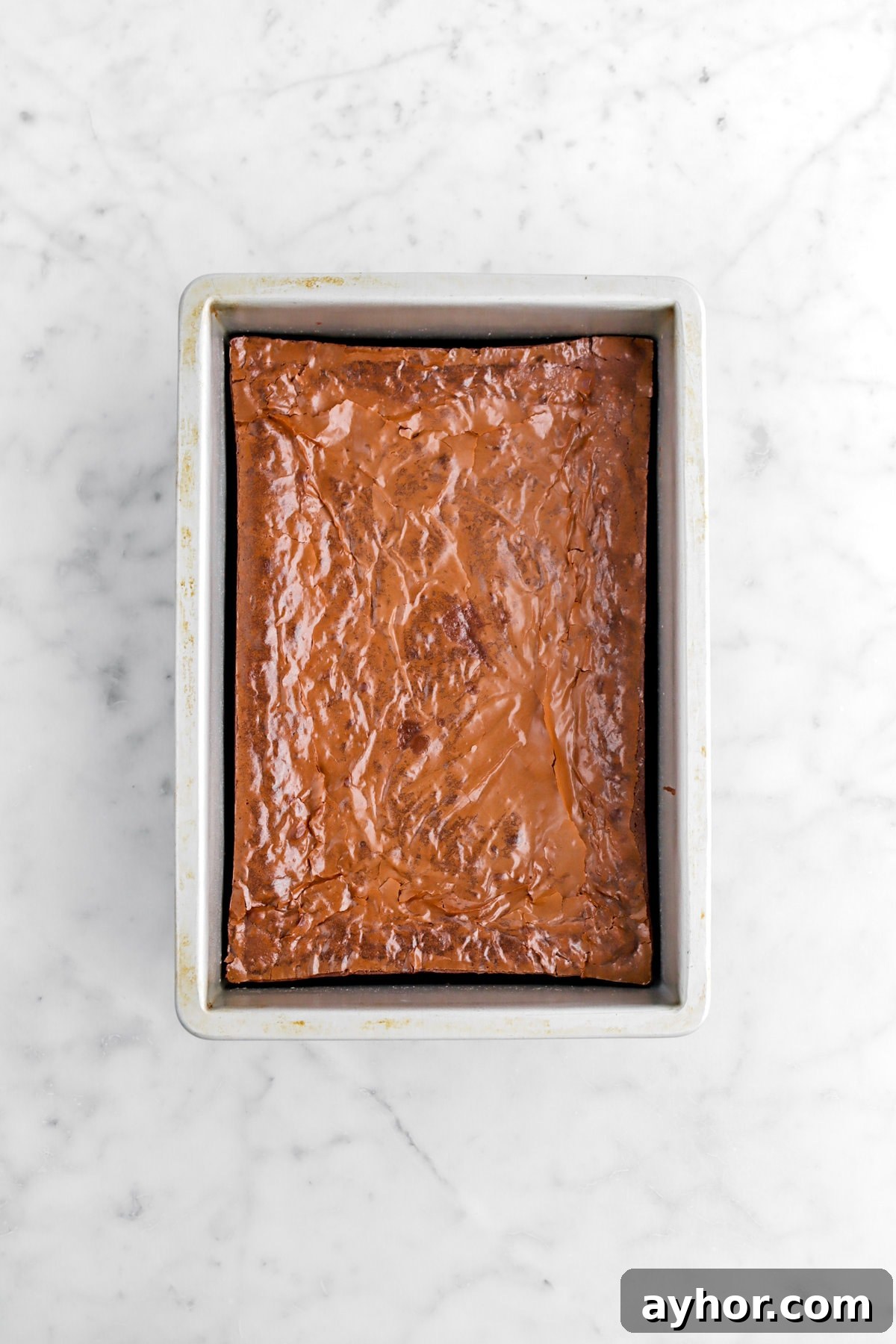 baked brownies in cake pan.