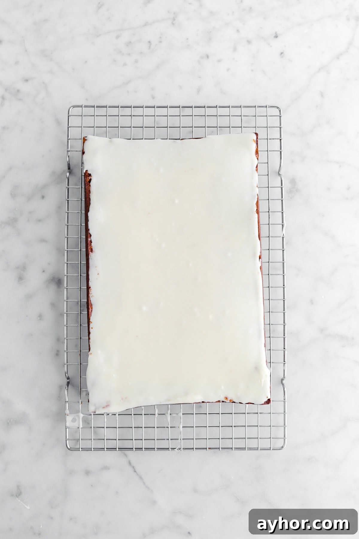 white chocolate spread over brownies.
