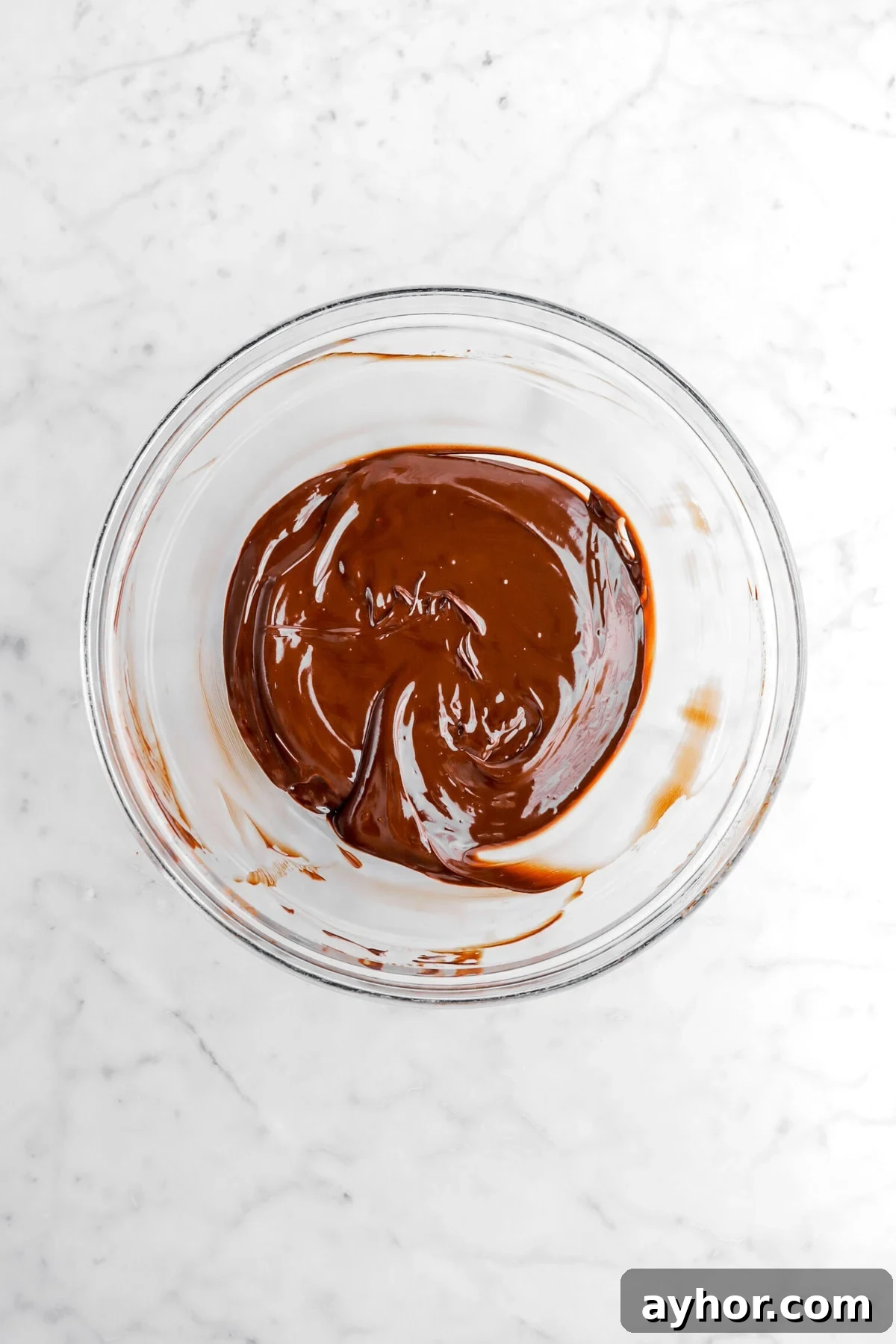 melted chocolate in glass bowl.