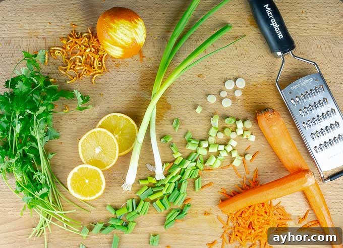 ingredients being prepped for Sticky Orange Chicken Recipe