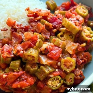 Quick Garlic Toast Recipe for Crispy, Flavorful Slices 12 A close-up of a plate featuring stewed okra and tomatoes alongside a serving of fluffy white rice.