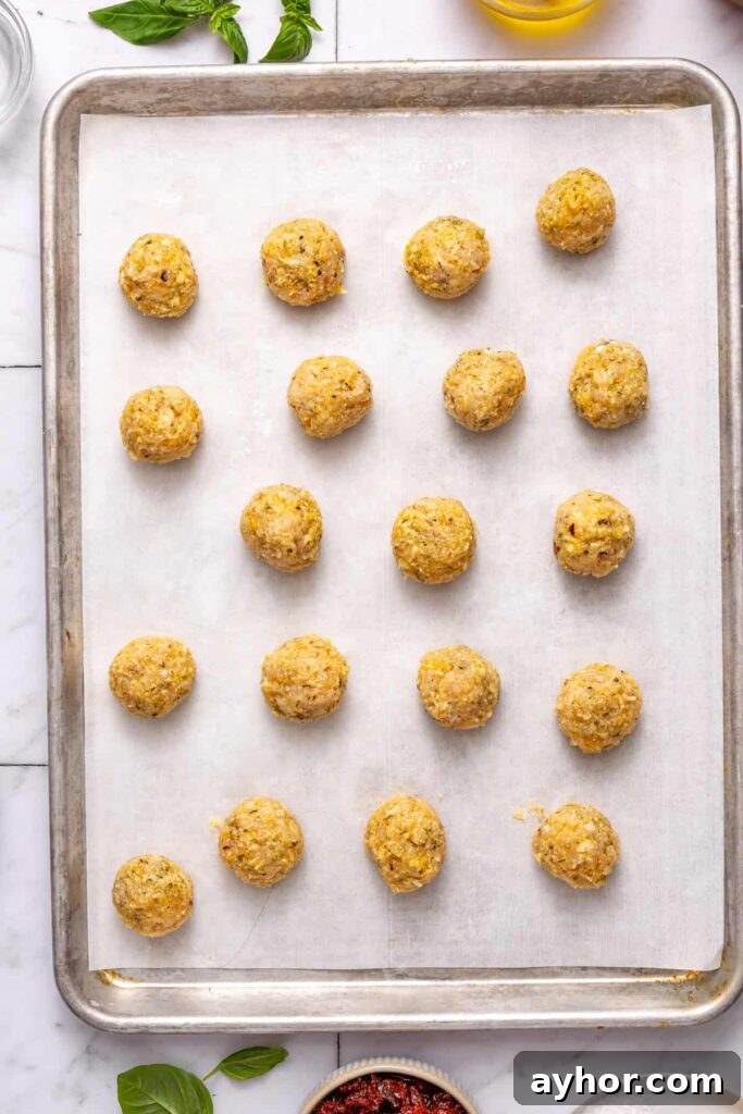 marry me chicken meatballs on baking pan before transferring to skillet