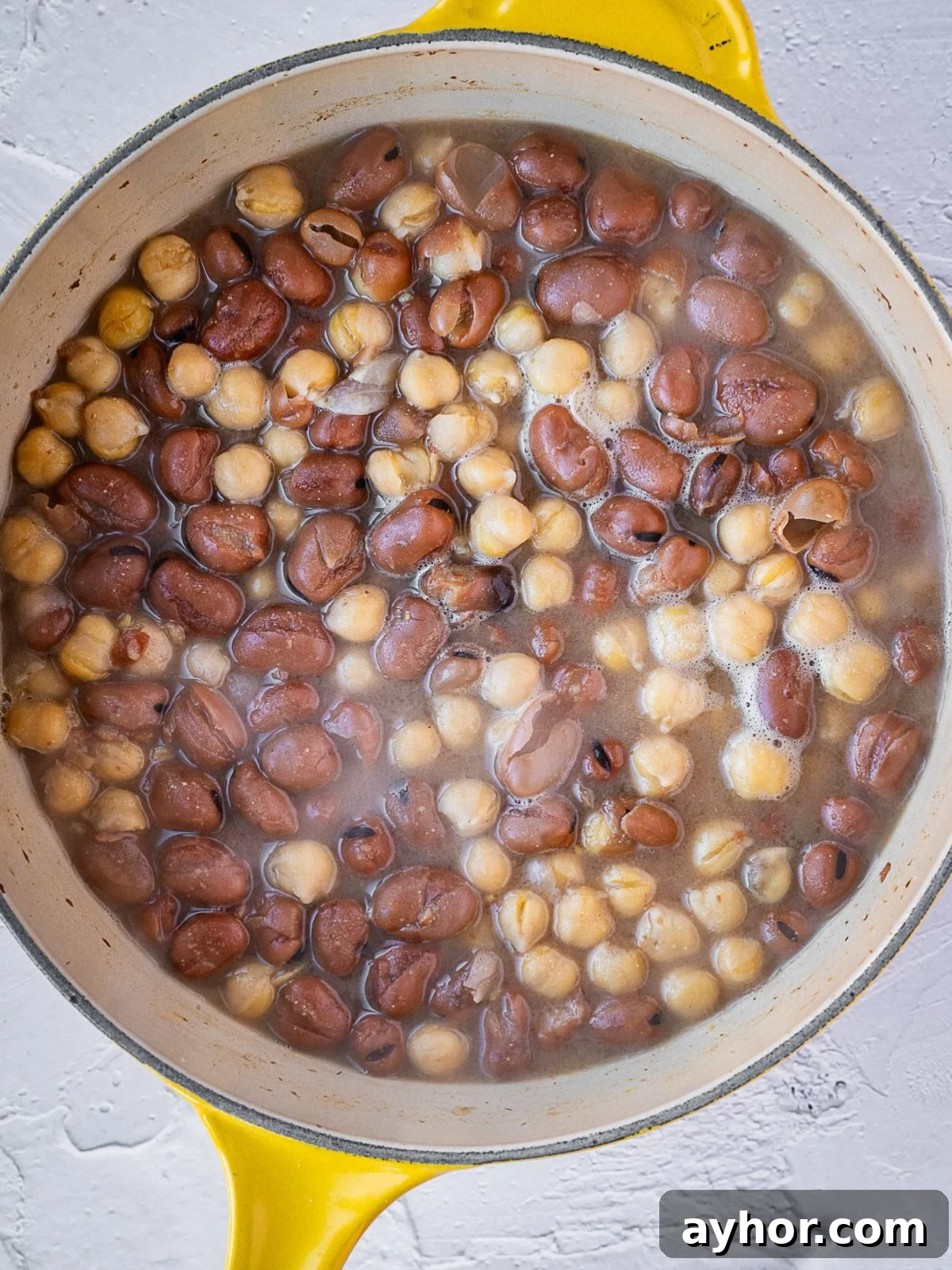 Levantine Ful Medames: Classic Chickpea & Fava Bean Stew Recipe 4 Pot with chickpeas and fava beans.