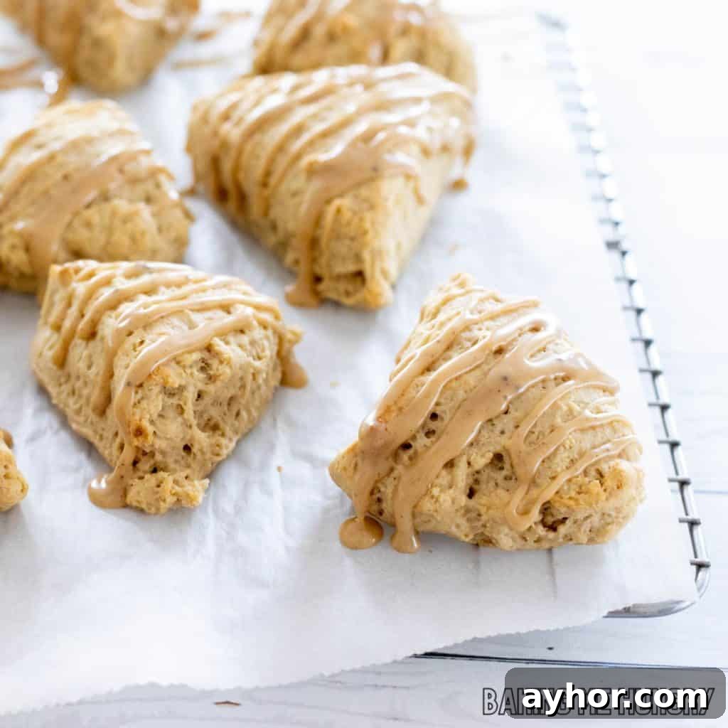 coffee scones on parchment with coffee glaze
