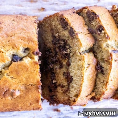 brown butter chocolate chip banana bread cut into slices close up