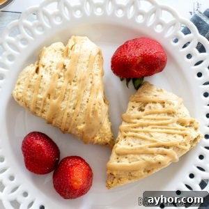 coffee scones recipe served on small plate with strawberries and cup of espresso