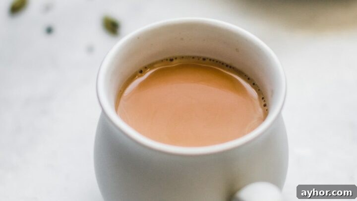 Authentic Pakistani Chai in a white teacup.