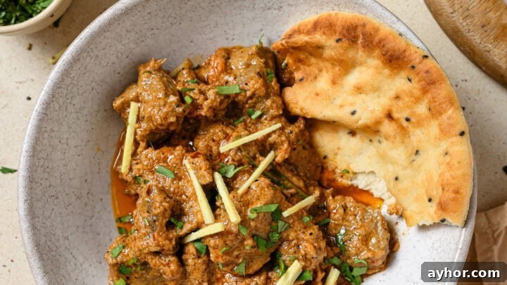 Mutton Karahi garnished with ginger and cilantro