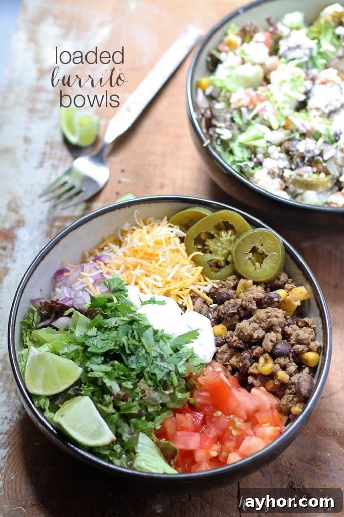 Loaded Burrito Bowls Recipe: Flavorful Chicken & Veggie Bowls 2 Loaded burrito bowls - a quick, customizable meal for picky eaters and busy nights.
