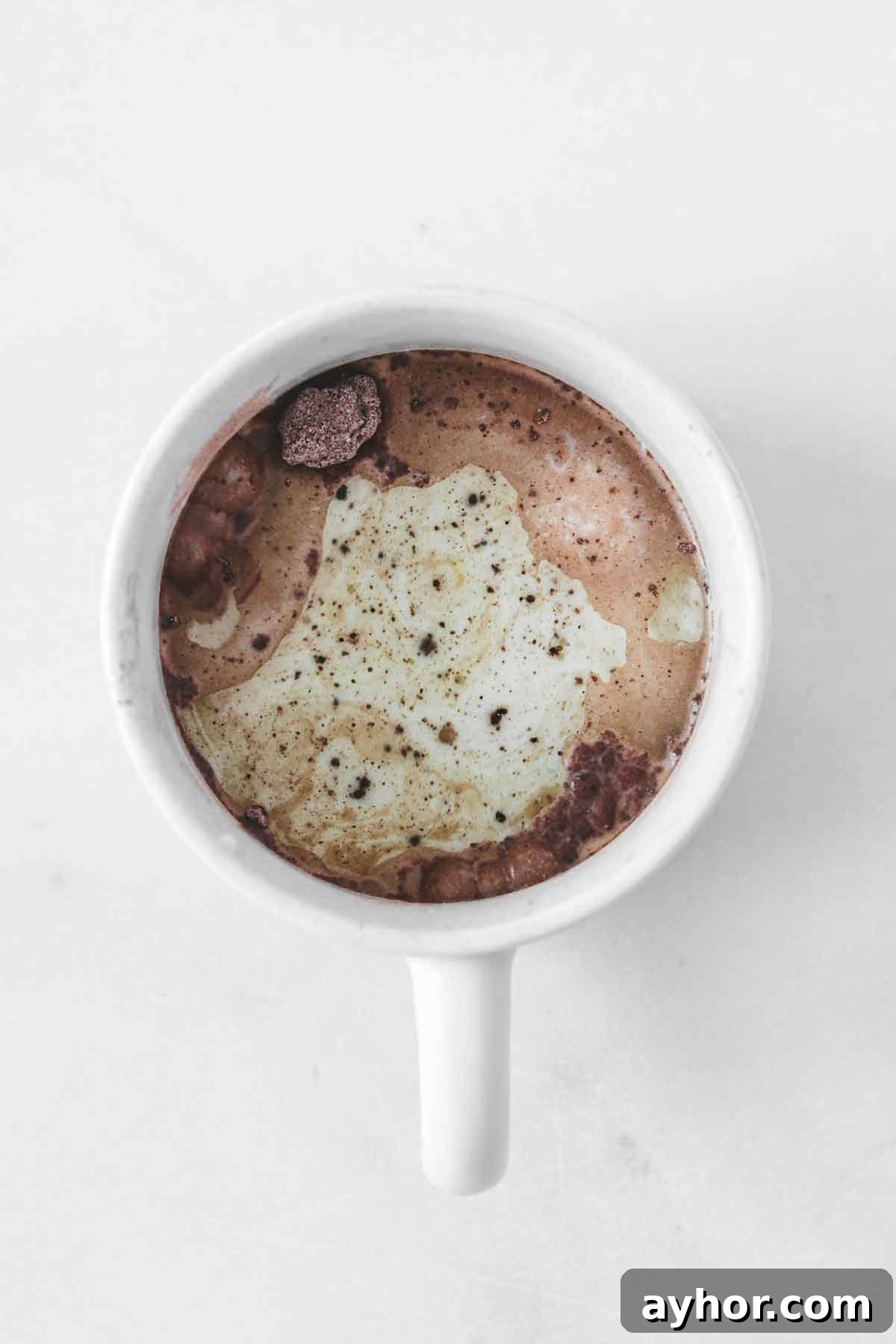 wet ingredients added to oreo mug cake batter
