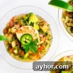 Authentic Mexican Shrimp Cocktail Recipe — Zesty Seafood Ceviche 12 Close up of shrimp cocktail in glass